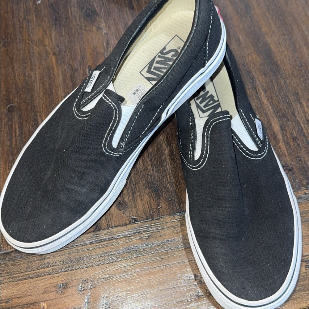 Vans Women's Black and White Slip-On Sneakers